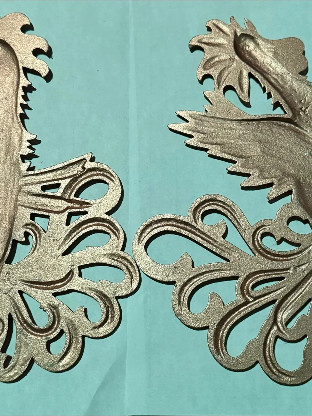 Vintage gold-painted aluminum or brass fighting rooster wall plaques